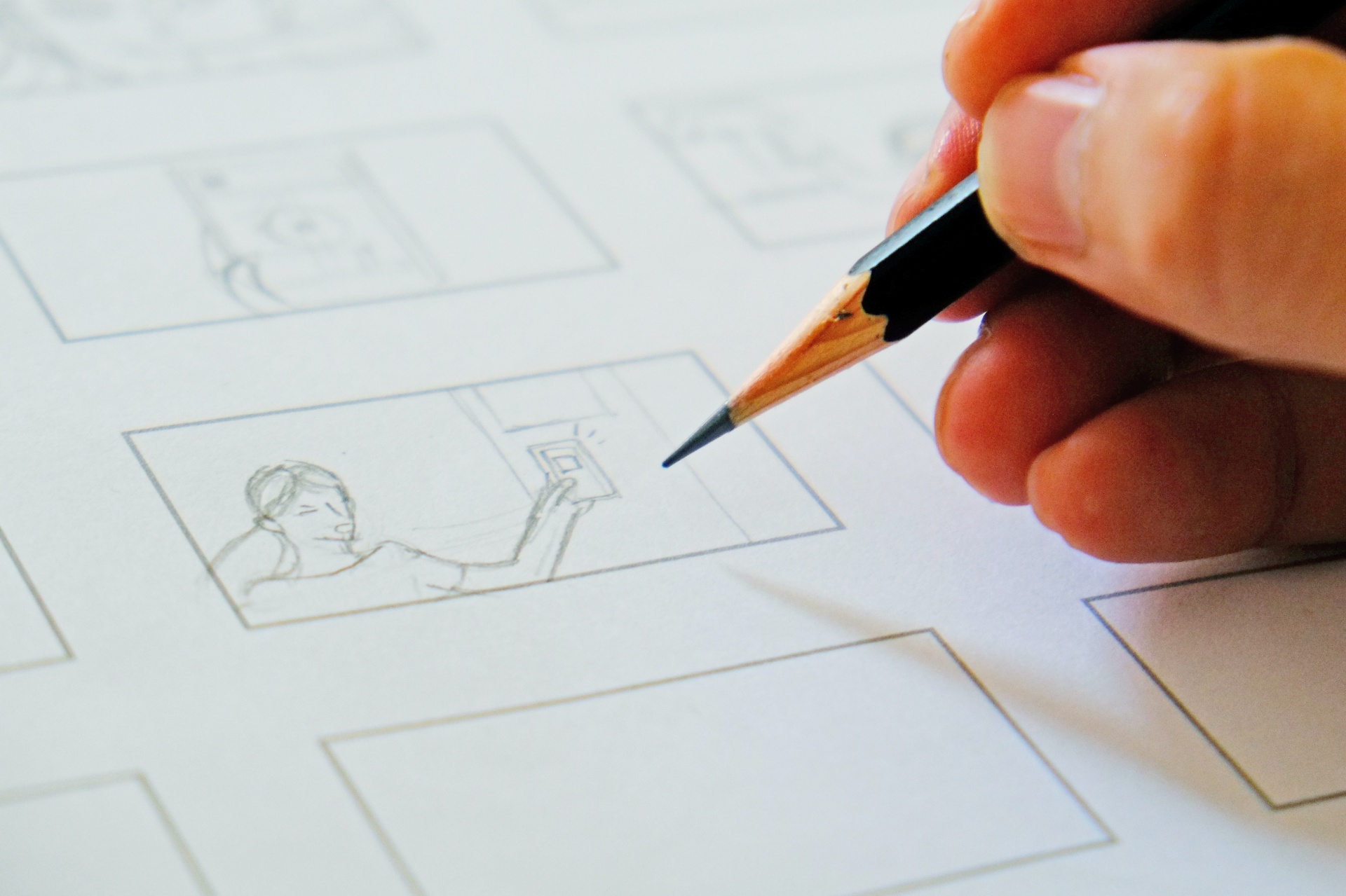 Person drawing a storyboard